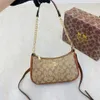 Barato por atacado 50% de desconto em novas bolsas de grife deste ano Bolsa popular Internet celebridade nas axilas ombro impresso