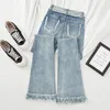 Уличный дизайн, расклешенные джинсы с необработанными краями, женские корейские винтажные узкие Vaqueros, повседневные эластичные джинсовые брюки с высокой талией, брюки-клеш 240307