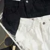 Damskie spodenki Nowa moda nowa letnie kobiety białe dżinsowe spodenki seksowna dziura rozryte mini dżinsy szorty damskie streetwear frędzle high talia shortsl24313