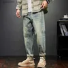 メンズジーンズの男性用バギーパンツルースフィットハーレムパンツビンテージ服の男性ファッションポケットパッチワーク大ズボン特大42 L240313