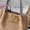 2024 Designer Tote Bag Raffias Straw Beach Shoulder Handväskor Stora 38 cm Fashion Crochet Purse Women Rivet Bag Metal Wallet Crossbody Luxury Makeup Clutch