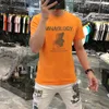 T-shirt estiva a maniche corte da uomo vestibilità slim perforazione a caldo orsacchiotto versatile cotone mercerizzato marchio di moda europeo da uomo Ins Dithering