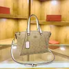 Shop Factory Großhandel Womens Bag 2024 Neue trendige und luxuriöse vielseitige Großkapazität Handheld -Eimer -Mütter ein Schulterkreuzkörper