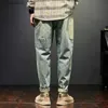 メンズジーンズの男性用バギーパンツルースフィットハーレムパンツビンテージ服の男性ファッションポケットパッチワーク大ズボン特大42 L240313