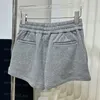 Donne con cappuccio grigio set da pista casual manica a maniche lunghe Stampa elastica per donna Shorts Shorts Outfit