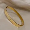 Bracciale rigido minimalista in acciaio inossidabile lucido Bracciale femminile punk oro argento polsino color braccialetti con ciondoli gioielli per mano impermeabile