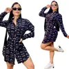 Nouveau desinger Femmes Casual lettre complète imprimé fleurs chemisiers blancs chemises simple boutonnage mode col en V Cardigan chemise haute robe livraison gratuite