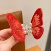 Akcesoria do włosów kółka dziecięce szpilki czerwono ruchomy ornament motyla