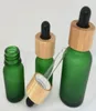 Frosted Amber Green Glass Droper Bottle 5 ml 10 ml 15 ml 30 ml 50 ml 100 ml med bambu cap 1oz trä eteriska oljeflaskor8988687