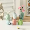 Vases Mini décorative Vase Ceramics Arrangement Bottle for Flower Hydroponic Plant Creative Flowers Vase Room Decor Ornement de bureau