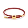 Bracciale regolabile di lusso multicolore con ciondolo regolabile Moda senza sbiadimento Filo di acciaio inossidabile Bracciale con corda impermeabile per uomo Donna GioielliL2403