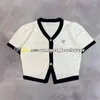 Sexy col en V pull été décontracté respirant tricoté à manches courtes avec boutons concepteur hauts en tricot femmes t-shirt