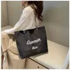 Bolsa tote minimalista para mulheres na moda japonesa e coreana impressa em tela com letras bolsa de ombro único bolsa feminina Instagram personalizada 240315