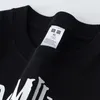 24SS Diseñador Europeo y Americano Hip Hop Devil Manga corta Instagram para hombre Marca de moda Cuello redondo Pareja suelta High Street Impresión oscura Camiseta versátil