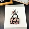 Keychains 100st/mycket Vacker metall leopard tryckväska Keyrings Creative Zinc Alloy for Gift