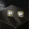 S925 Aiguille en argent Corée Boucles d'oreilles en perles géométriques avec diamants Boucles d'oreilles en spirale Sens supérieur du tempérament La nouvelle fille