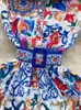 Piste rouge bleu et blanc porcelaine fleur imprimé débardeur sans manches simple boutonnage ceinture Midi plage fête robe 240312