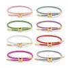 Bracciale regolabile di lusso multicolore con ciondolo regolabile Moda senza sbiadimento Filo di acciaio inossidabile Bracciale con corda impermeabile per uomo Donna GioielliL2403