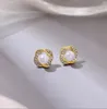 S925 Aiguille en argent Corée Boucles d'oreilles en perles géométriques avec diamants Boucles d'oreilles en spirale Sens supérieur du tempérament La nouvelle fille