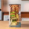 3D Puzzles Robotime Rolife Diy Book Nook Wood Miniature Doll House för bokhylla Insert Furniture 240314