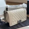 Sac à bandoulière de créateurs luxueux Sacs à bandoulière en peau de mouton caviar classique Sac à main en cuir véritable Diamond Lattice Chaînes matérielles en or et en argent Coffret cadeau