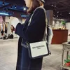 Letnia torebka torebki 2024 NOWA moda swobodna małe kwadratowe torby Wysokiej jakości unikalne designerskie torby na ramię