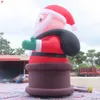 Outdoor Activities 33ft Giant Inflatable Santa Claus on Chimney Xmas Advertising Model with led light For Yard Decoration