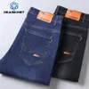 Homens primavera grande tamanho negócios casual jeans outono moda solta estiramento calças retas de alta qualidade marca calças masculinas 240305