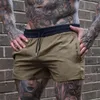 Mężczyźni szorty lekkie cienkie krótkie spodnie bieganie Squat Fitness Shorts Mężczyznę noszą szybkie suszące szorty sznurkowe 240314