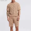 Men's Tracksuits Mens crochet summer set mens fashion set casual sportswear loose fitting short sleeved shirt knitted two-piece set Q240314