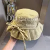 Дизайнерская рыбацкая шляпа Летняя шляпа от солнца для женщин Широкополая шляпа с рюшами и полями Модная шляпа с галстуком-бабочкой Отпускная солнцезащитная шляпа