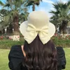 Ampla borda chapéus dobrável grande floppy meninas chapéu de palha sol com bowknot elegante proteção sombreamento moda praia bonés para mulher 2024