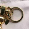 Designer Luxury Designer Keychain Fashion Letter Form Pendant Keychains Fashion Gold Keys Buckle Mens Womens Bag Ornament High Quality EN88