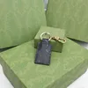 Designer xury porte-clés longes en cuir alliage d'or design astronaute porte-clés accessoires designer porte-clés en métal solide porte-clés boîte-cadeau emballage W55A categ