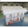 Activités de plein air à porte gratuite 6 ml x 4 m l x 3,5 mH (20 x 13,2 x 11,5 pieds) Grotte gonflable du Père Noël à impression numérique comme une maison à 2 étages à vendre