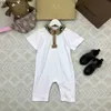 Nieuwe peuter jumpsuits babykleding met korte mouwen maat 52-100 designer pasgeboren kruippakje geruite revers baby bodysuit 24 maart