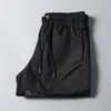 24ss Pantalones cortos de diseño para hombre traje de baño para mujer playa corta de lujo impermeable etiqueta bordada de secado rápido con malla transpirable deportes pantalones de yoga verano ffy123