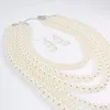 Mode Multilayer Faux Pearl Beads Halsband Örhängen smycken sätter kvinnor bröllop brud uttalande stor krage choker halsband 240311