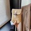 Sacs pour téléphone portable Sac à main tissé en paille fait à la main pour femme dans un sac à bandoulière de niche simple et tendance, sac polyvalent d'été pour téléphone portable