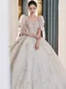 Abiti da sposa con maniche corte modeste Abiti da sposa Abiti da sposa Collo gioiello trasparente Paillettes applicate in pizzo Taglie forti Robe De Mariee Realizzato su misura