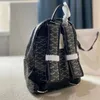 Nuevos diseñadores para mujeres mochila nylon neutral en forma de Y en forma de Y de lienzo de lienzo de lienzo de gran capacidad de gran capacidad mochila mano mochila de lujo mochila bolso de mochila