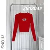 Tricots pour femmes Tees Designer D Family 2023 Automne Nouvelle lettre en métal creux Slim Fit et Pure Desire Col rond Top tricoté Z60304 # ZXFQ