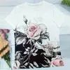 Blouses pour femmes Chemisier à manches courtes Chemisier doux et extensible Femmes Top Imprimé floral Tops tuniques pour Streetwear Coupe ample Vêtements d'été mignons