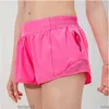 L-091 Hot Low Rise Shorts Breattable Quick-Dry Yoga Inbyggd fodrad sport kort dold blixtlås sido-droppfickor som kör svettbyxor med kontinuerlig dragkordikaa