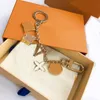 Tasarımcı Moda Anahtar Tutucu Keychain Araba Luxurys Tasarımcılar Anahtarlık Araç Key Fashion Çiçek Keyasyon Çantası Cazibe severler Hediye 2211103Z N8n8