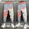 Mäns jeans män harajuku hiphop streetwear designer märke harem byxor utomhus casual skarvbyxor mode manliga kläder