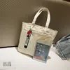 Sac en toile femmes japonais et coréen Instagram grande capacité collège étudiant classe sac fourre-tout sac à bandoulière portable 240315