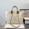2024 Designer Bag Summer Beach C Letter Shoulder Bag Flash Office Bag Classic Womens Canvas Bag With Button Retro Luxury Bag