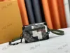 M24581 Mini coffre souple concepteur hommes sac à bandoulière toile cuir unique sac à bandoulière chaîne décoration sac à main