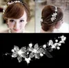 2020 tani w Stock Spring Bridal Tiaras korony opaski na głowę Wedding Hair Akcesoria Faux Pearl Flower B lśniące kryształ tiara 9196840